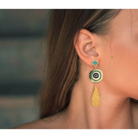 Mati Plexiglass Earrings POUPADOU, wore by a woman