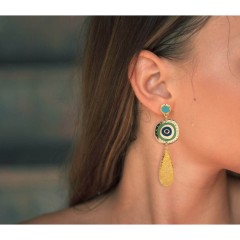 Mati Plexiglass Earrings POUPADOU, wore by a woman