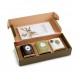 Coffret cadeau d'huiles d'olive extra vierge 3x100ml Greenolia avec l'emballage ouvert vu de haut