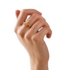 Psaraki 24K gold plated ring worn on a hand