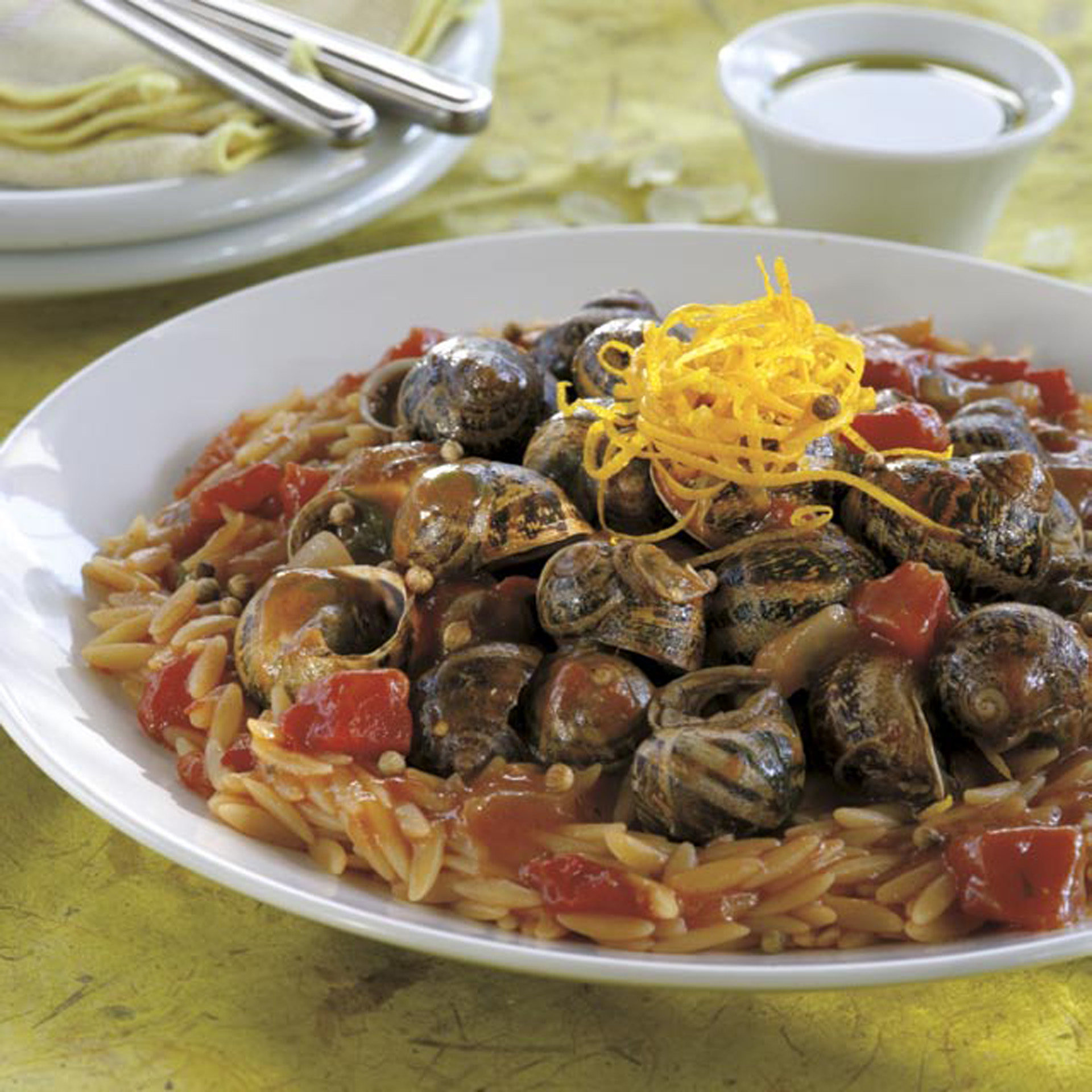 Orzo with snails and Chios olive oil