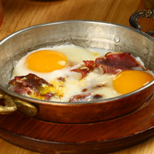 Saganaki with pastourma and eggs